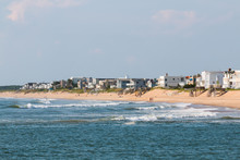 Homes Line The Virginia Beach Shore Near The Boardwalk And Rudee Inlet.