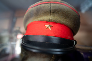 Old Military Cap With Red Star Symbol, The scene war cap in World War 2. ..