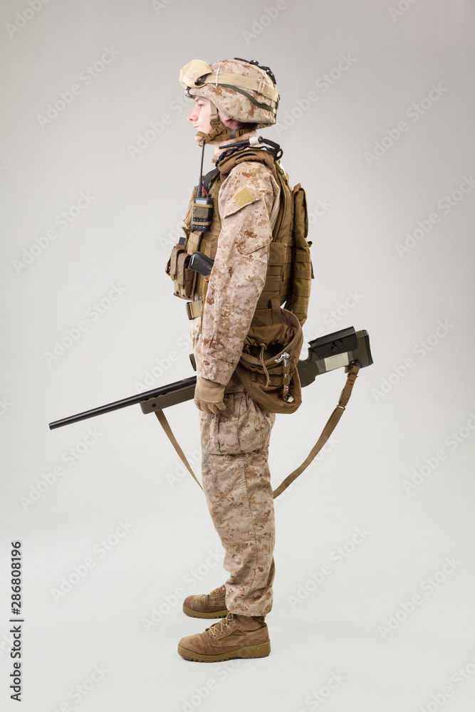 Modern Rifles Uniform Studio shoot of modern infantry soldier, U.S. marine rifleman in combat ...