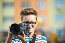 Funny Teen Boy With Digital Photo Camera