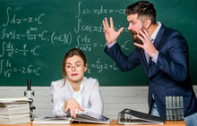 Man Unhappy Communicating. School Principal Talking About Punishment. Conflict Situation. School Conflict. Demanding Lecturer. Teacher Strict Serious Bearded Man Having Conflict With Student Girl