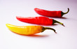 © predrag - red chili peppers on white background