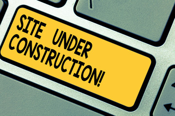 Fototapete - Handwriting text Site Under Construction. Concept meaning Implies something is being built for the first time Keyboard key Intention to create computer message pressing keypad idea