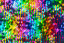 Texture Of Rainbow Shiny Sequins. Fashionable Bright Fabric With Sequins.