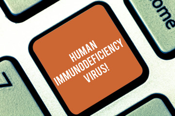 Conceptual hand writing showing Huanalysis Immunodeficiency Virus. Business photo text virus in huanalysis blood that weakens immune system Keyboard key Intention to create computer message idea