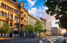 Evening street big city Budapest Hungary. Picturesque sunset. Landscape with residential and commercial house. Panorama road.