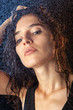© rvas - Closeup portrait of sexy wet brunette in black shirt