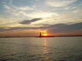 Fototapeta Morze - Sunset Featuring The Statue Of Liberty