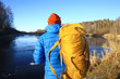 © kichigin19 - winter landscape man with a backpack / nature landscape a man on a hike with equipment in snowy weather in Canada