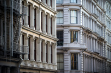 Architectural Detail View Of Traditional Cast Iron Buildings In The Soho Cast Iron Historic District In Downtown Manhattan, New York City
