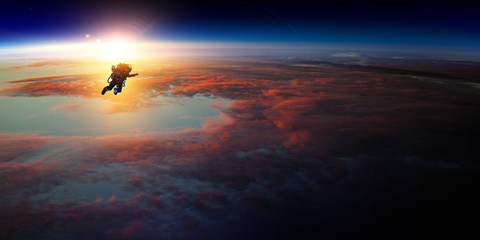 Wall Mural - spaceman and planet, human in space concept