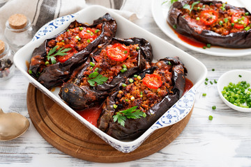 Wall Mural - Karniyarik - Stuffed Eggplants, Aubergines with minced meat and vegetables baked with tomato sauce .