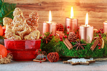 Sticker - Cookies in Christmas tree shape. and beautiful decorations in the background.