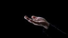 Male Hand Asking For Help On Dark Background, Begging For Donation, Poverty