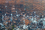 Fototapeta Do pokoju - Old Weathered Damaged Red Bricks Wall