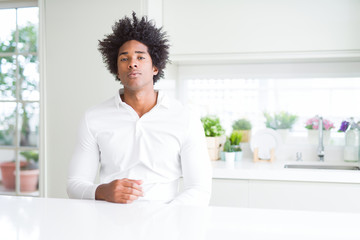 Sticker - African American man with serious expression on face. Simple and natural looking at the camera.