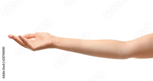 Fotomural Young woman holding something on white background, closeup
