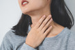 © Pormezz - Symptoms from flu season in winter concepts. Close up woman touching her neck and suffering from sore throat.