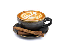 Side View Of Hot Latte Coffee With Latte Art And Cinnamon Sticks In A Vintage Matt Black Cup And Saucer Isolated On White Background With Clipping Path Inside. Image Stacking Techniques.
