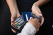 Female customer pay hold credit card use contactless nfc technology