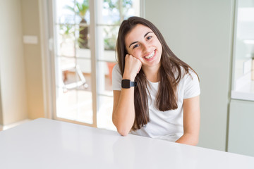 Poster - Beautiful young brunette woman smiling cheerful looking at the camera with a big smile on face showing teeth