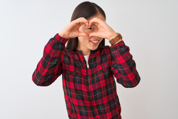 Sticker - Young chinese woman wearing casual jacket standing over isolated white background Doing heart shape with hand and fingers smiling looking through sign