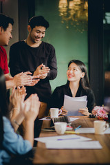 asian freelance team meeting with happiness in modern home office