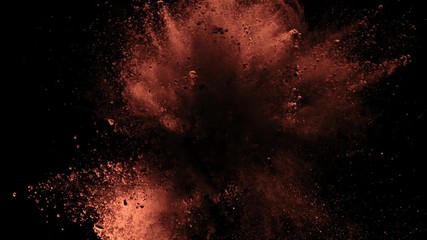 Super Slow Motion Shot of Cocoa Powder Explosion Isolated on Black Background at 1000fps.