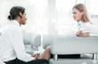 © yurolaitsalbert - closeup.colleagues talking ,sitting in the lobby of the office
