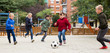 © JackF - Group of laughing children playing football