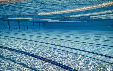 Olympic Swimming pool under water background.