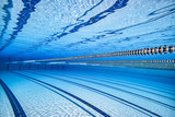 Fototapeta  - Olympic Swimming pool under water background.