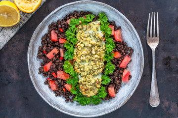 Canvas Print - Pesto-crusted cod with Puy lentils and tomatoes in a bowl