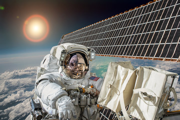 Wall Mural - astronaut in outer space