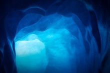 Blue Ice Inside A Cave Under Melting Rhone Glacier