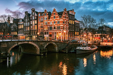 Beautiful Canal Houses On The Corner Of Brouwersgracht And Prinsengracht In The Old Center Of Amsterdam During Sunset