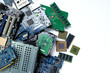 © damrong - Pile of electronic waste, Motherboard computer and cpu microchips  electronic equipment, Printed Circuit Board on white background, E-waste is a problem with environmental concepts should be reused