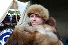 Person In Fur Hat And Cape