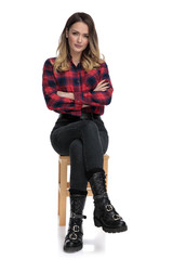 Sticker - casual woman sitting with arms crossed