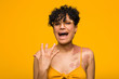 © Asier - Young african american woman with skin birth mark screaming with rage.