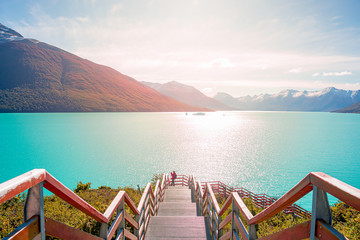 Direct sunlight view at the Lago Argentino near huge Perito Moreno glacier in Patagonia in golden Autumn, South America