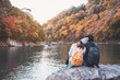 © Kittiphan - Young couple traveler looking beautiful landscape at arashiyama Japan, Travel lifestyle concept