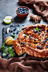 Sticker - sliced Apple Blueberry Pie on a stone plate