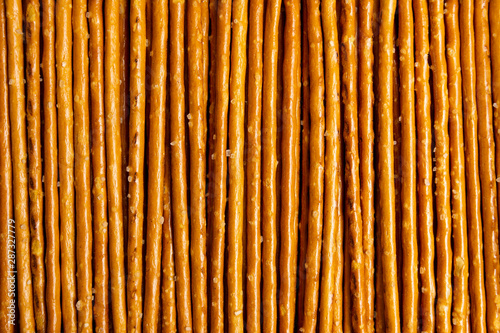Fotografía Salty bread sticks background pattern