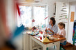 © Stock Rocket - Mother and daughter painting Christmass ornaments