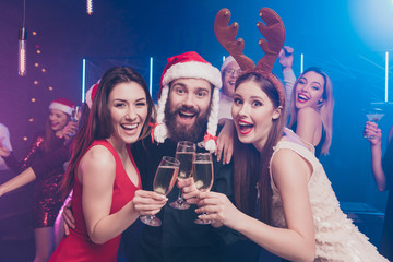 Poster - Portrait of nice attractive stylish cheerful cheery positive funny ladies and guys having fun chill out great vacation festive feast festal greetings at modern luxury fogged nightclub