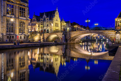 View of Graslei, Korenlei quays, Leie river and St Michael's bridge in the hi...