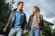 © Unique Vision - Young beautiful couple in garden near house.