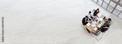 Fotografía Top view of group of multiethnic busy people working in an office, Aerial view w