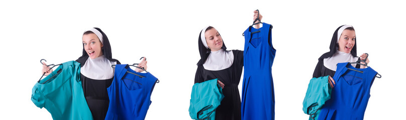 Wall Mural - Nun choosing clothing on the hanger isolated on white